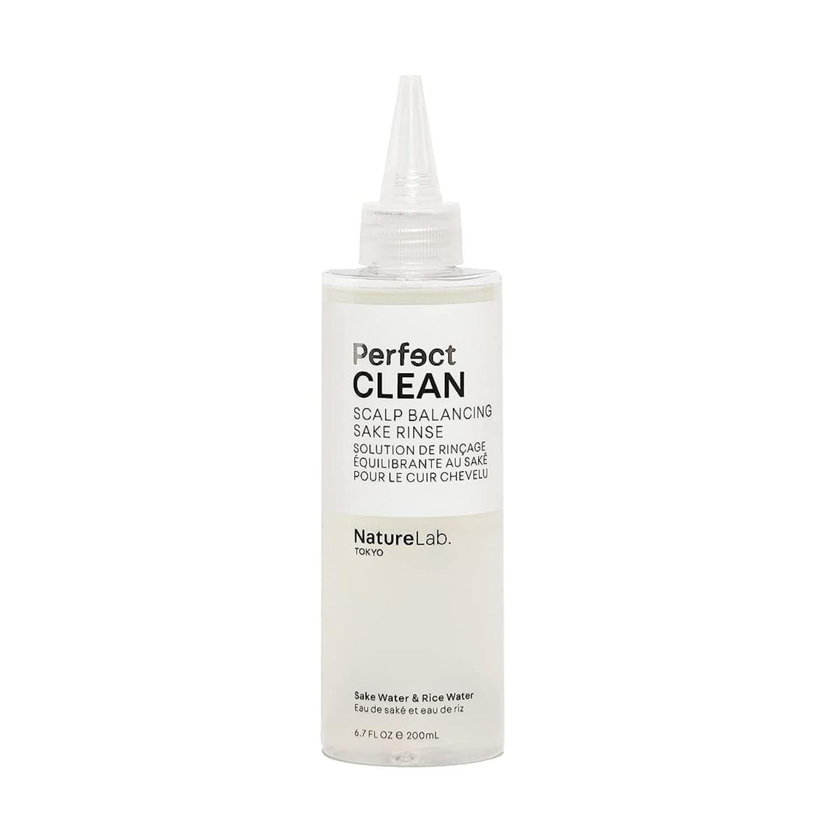 NatureLab.TOKYO Perfect Clean Sake Rinse bottle on a bathroom shelf for balanced scalp hydration.