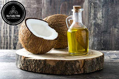 Naturevibe Botanicals coconut oil pour closeup shows clear non-greasy texture