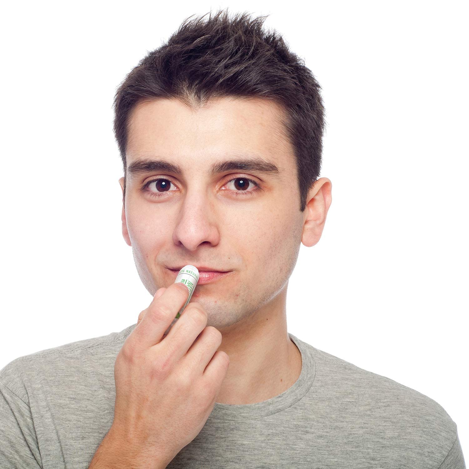 Naturistick lip balm application scene showing silky glide and moisture.