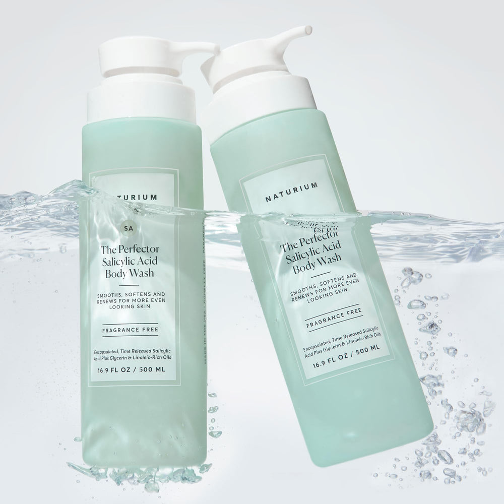 Naturium Perfector body wash on hand showing massage-friendly cleansing