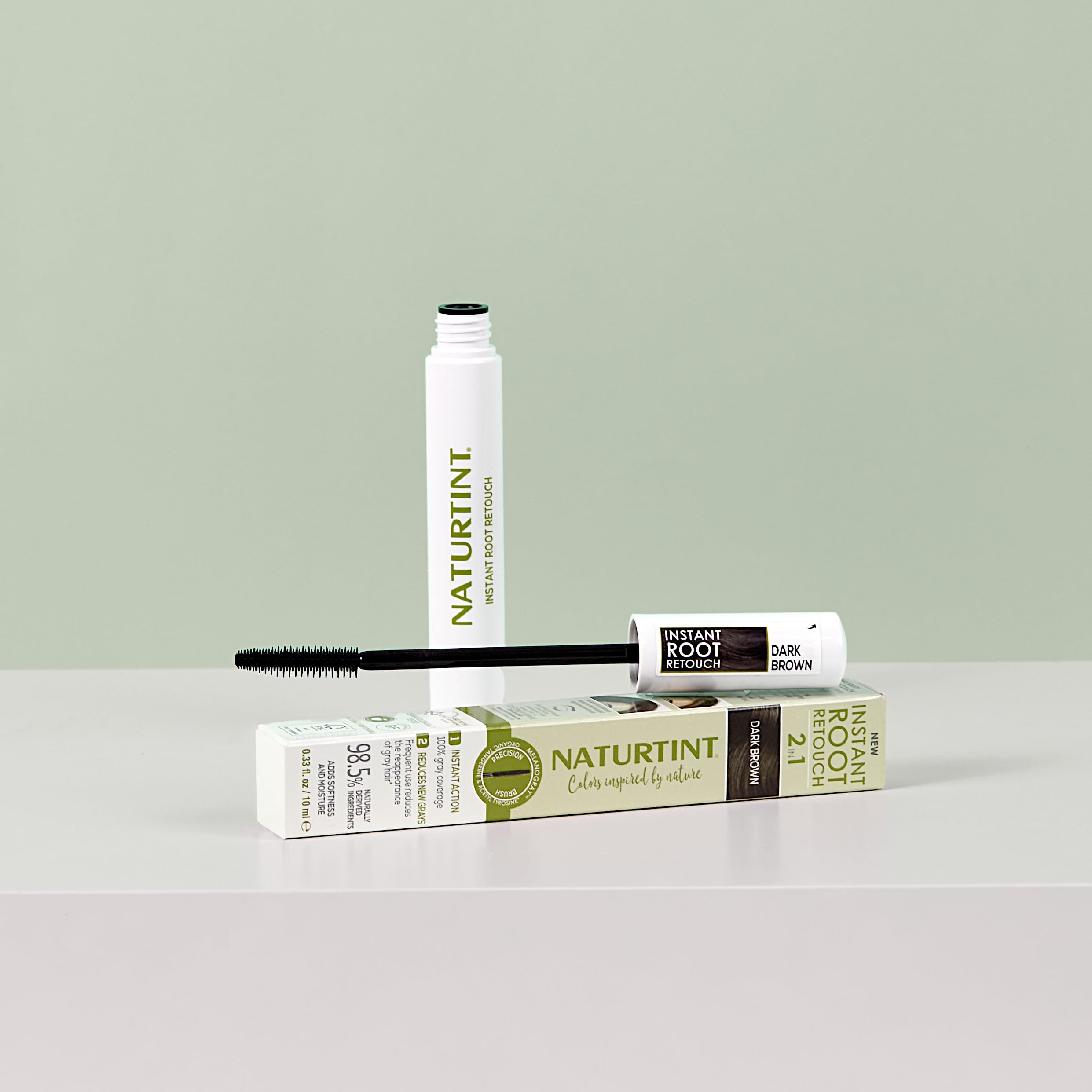 Naturtint Instant Root Retouch shade range includes black and dark brown for versatile blending.