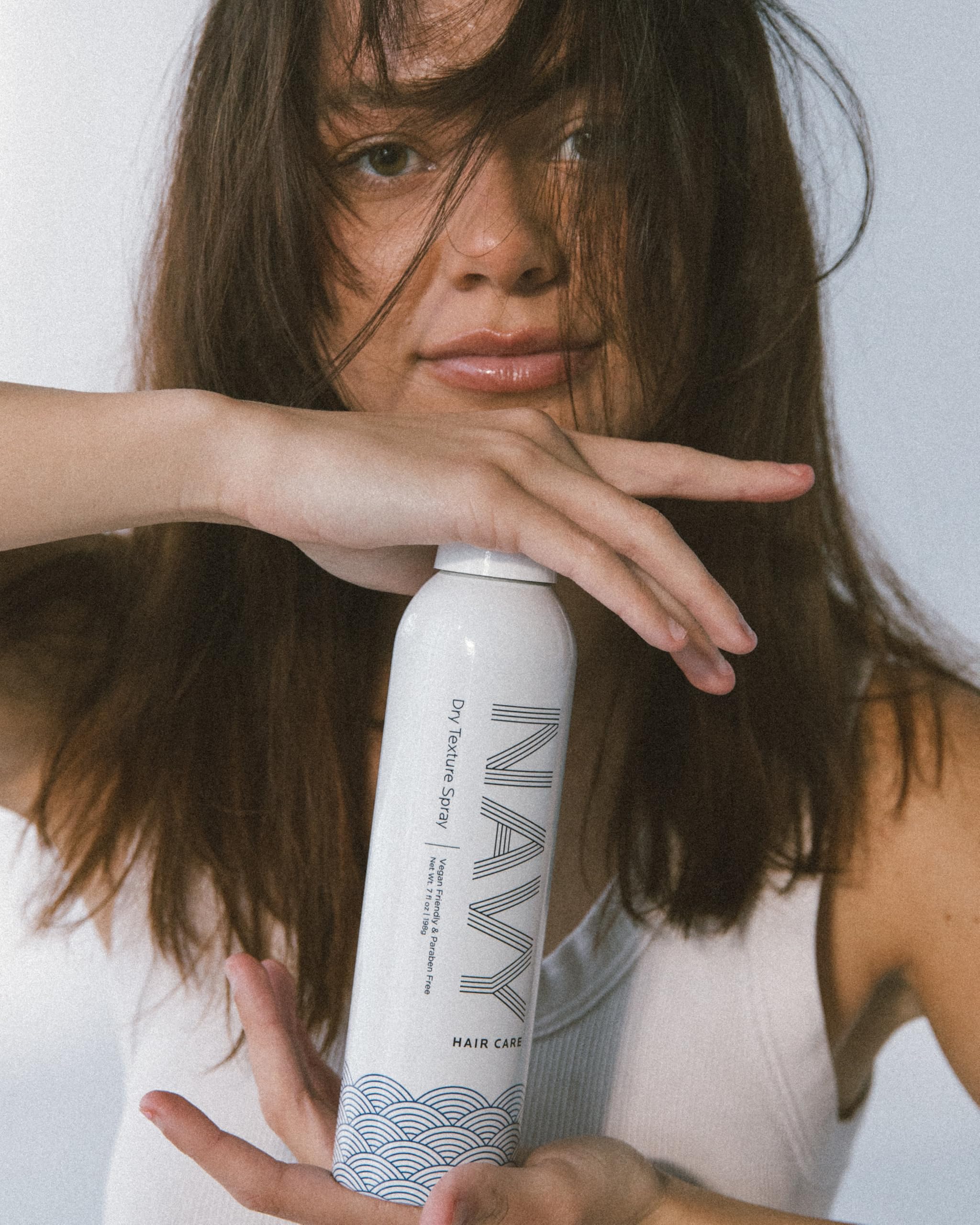 NAVY HAIR CARE packaging sustainability seal emphasizes cruelty-free vegan formula