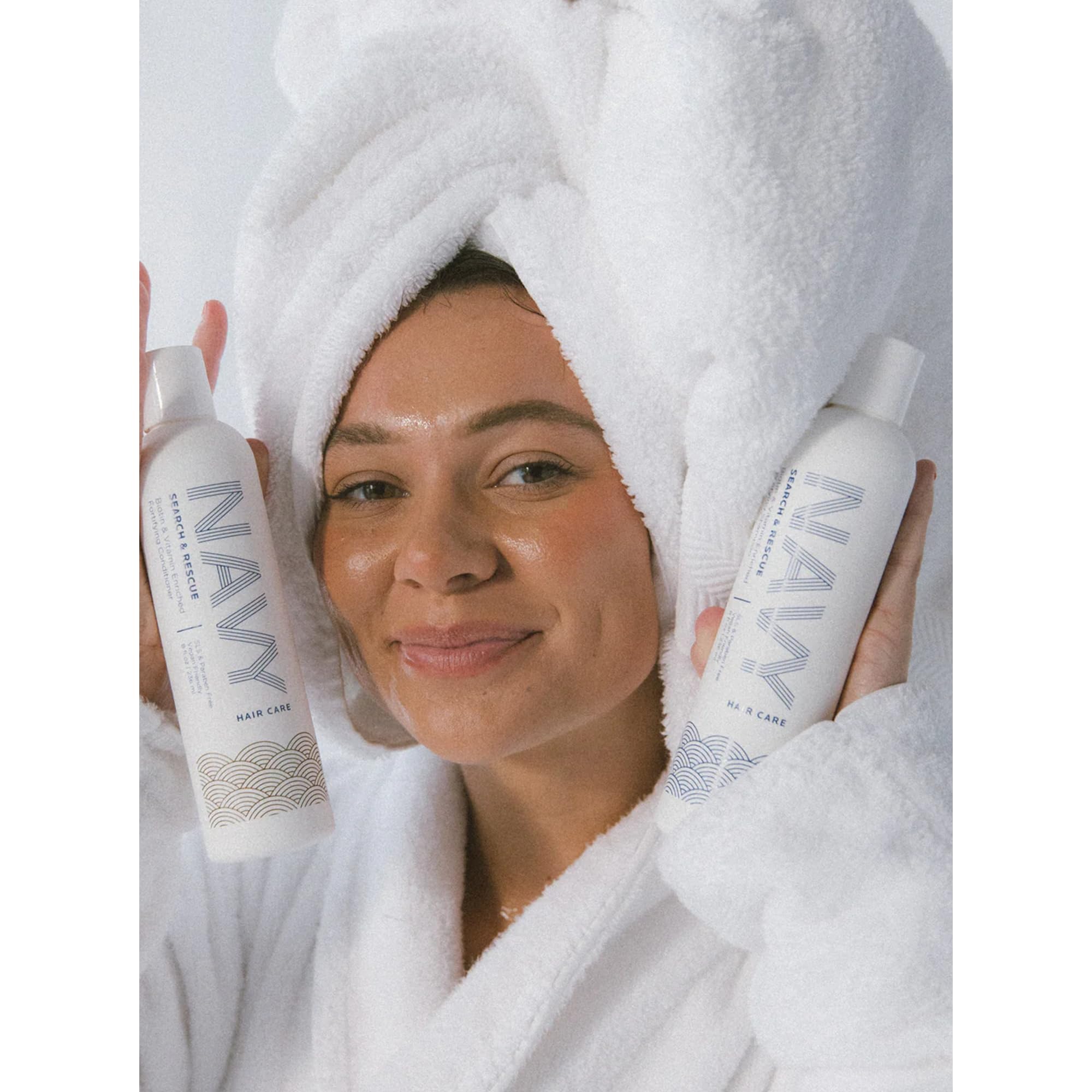 NAVY HAIR CARE Conditioner pump closeup emphasizes smoothing and hydration.