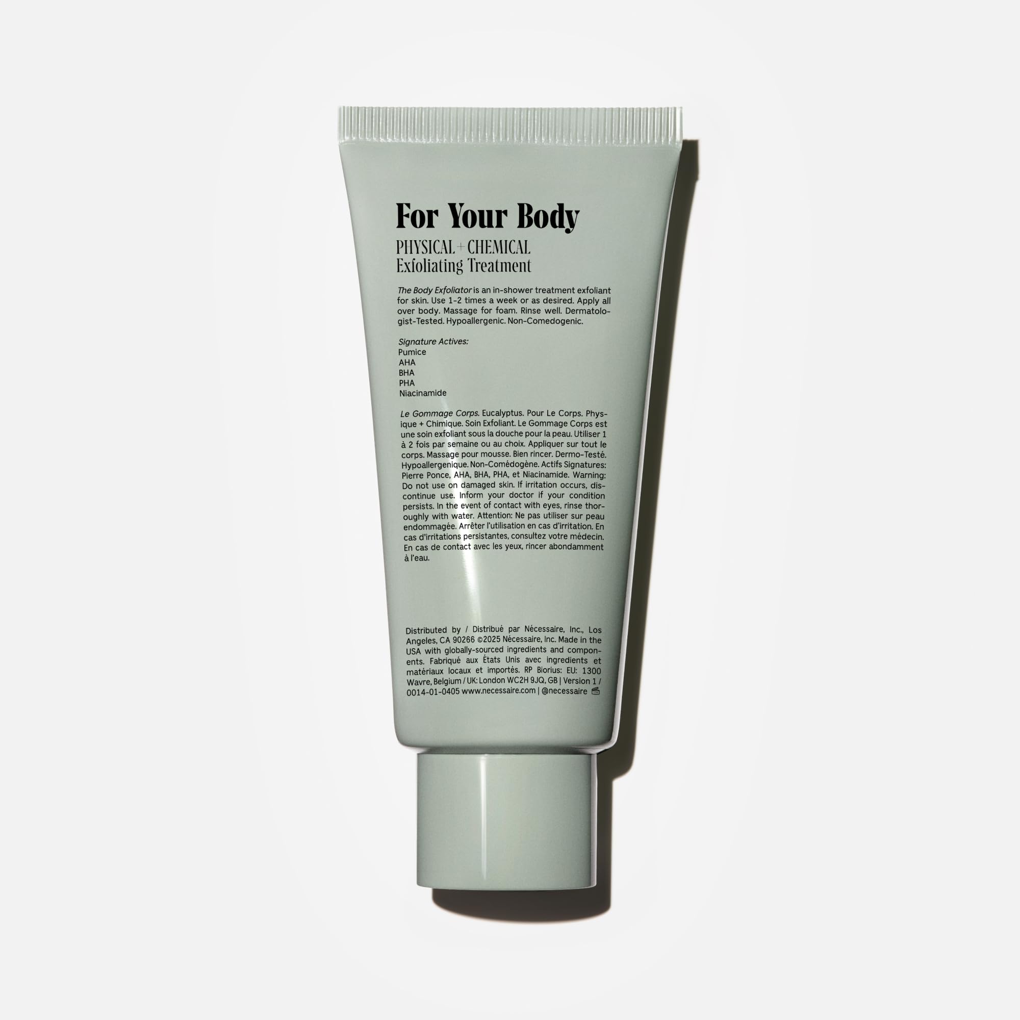 Nécessaire The Body Exfoliator bottle side profile on compact packaging