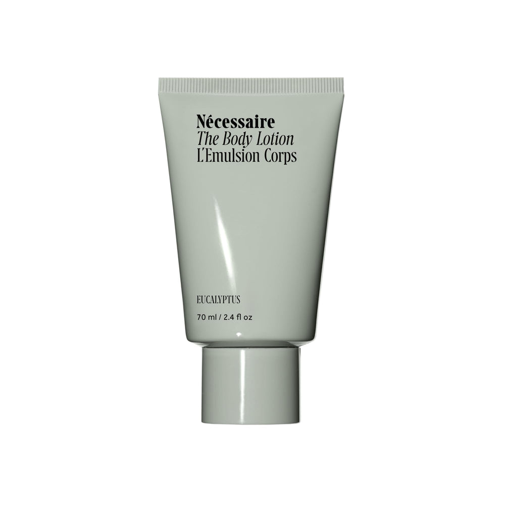 Nécessaire The Body Lotion Mini Eucalyptus bottle ready for travel hydration.
