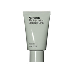 Nécessaire The Body Lotion Mini Eucalyptus bottle ready for travel hydration.
