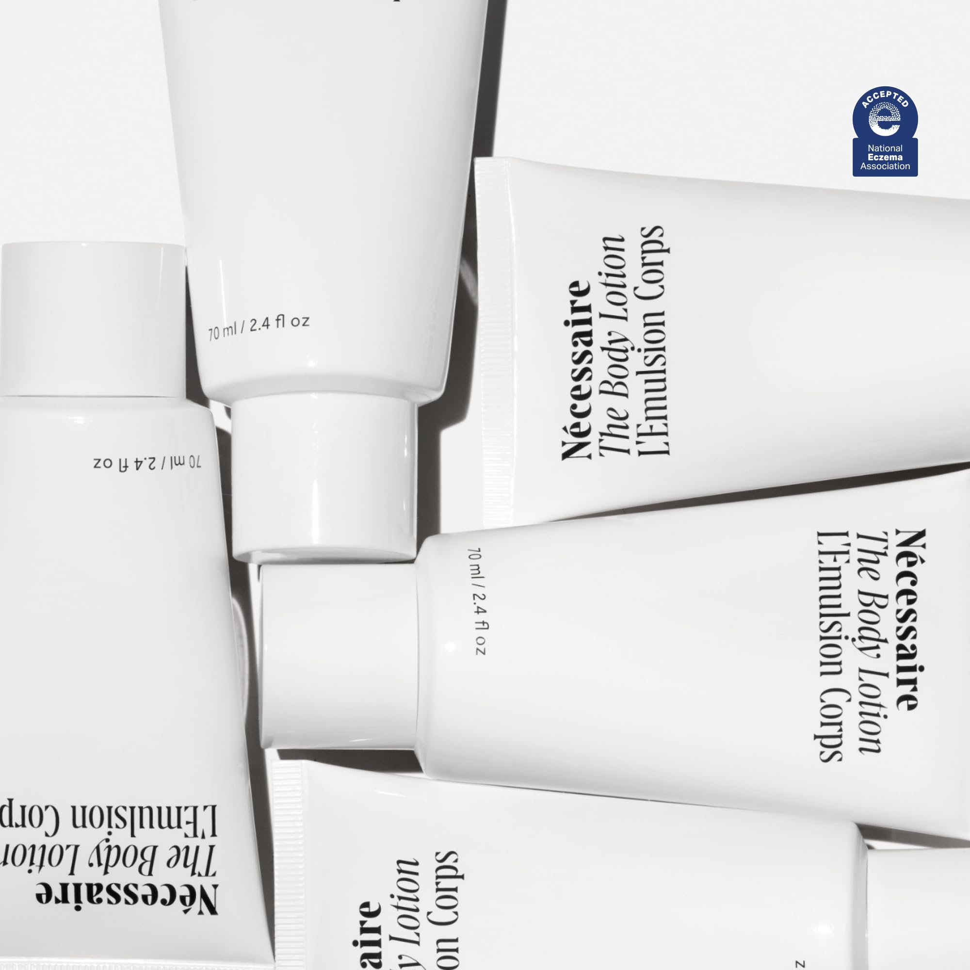 Nécessaire body lotion vitamin C/E oils close-up shows nourishing antioxidants