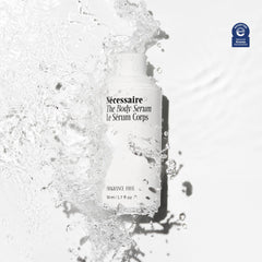 Nécessaire The Body Serum applied to arm demonstrates non-greasy moisture.