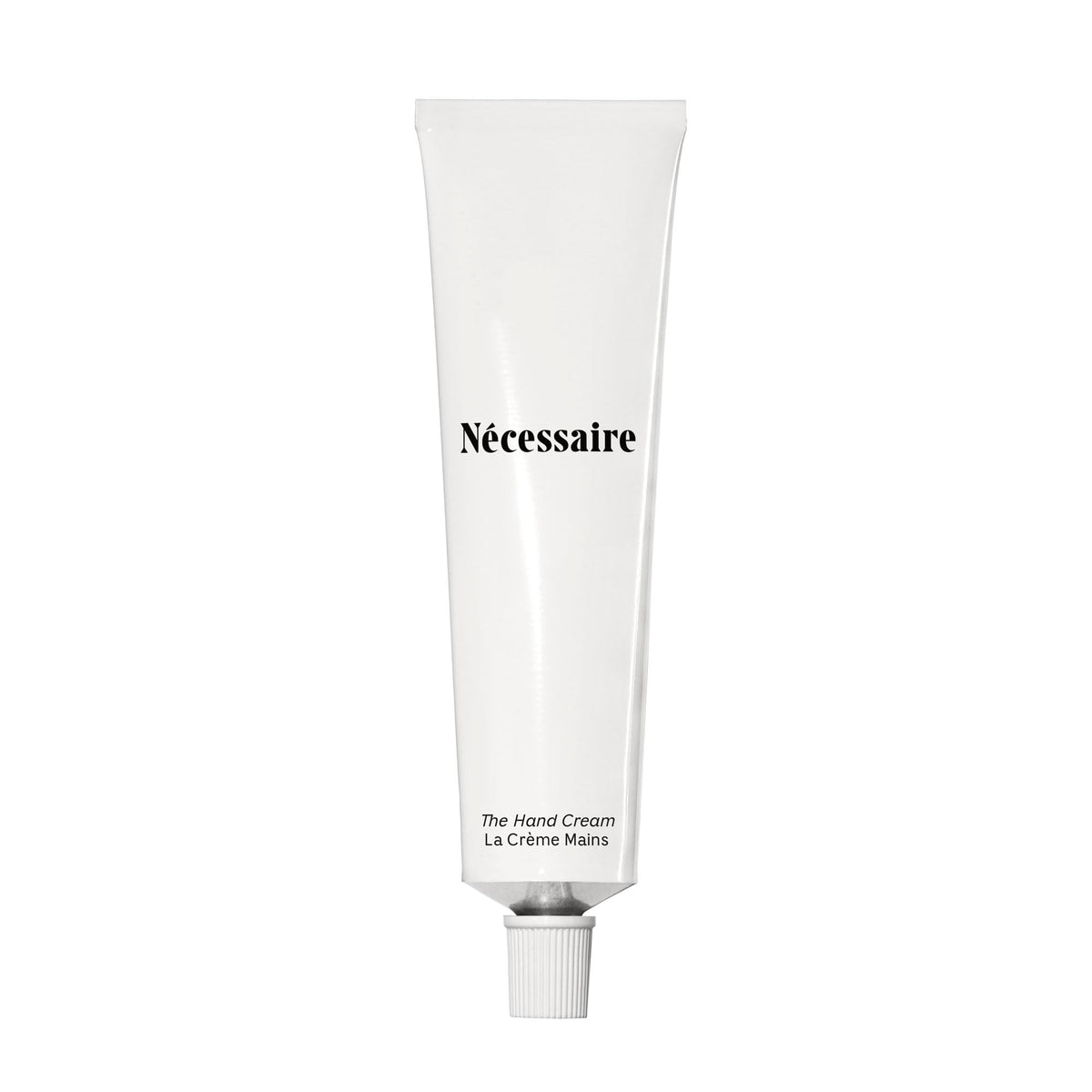 Nécessaire Hand Cream tube closeup showing fragrance-free formula for sensitive skin