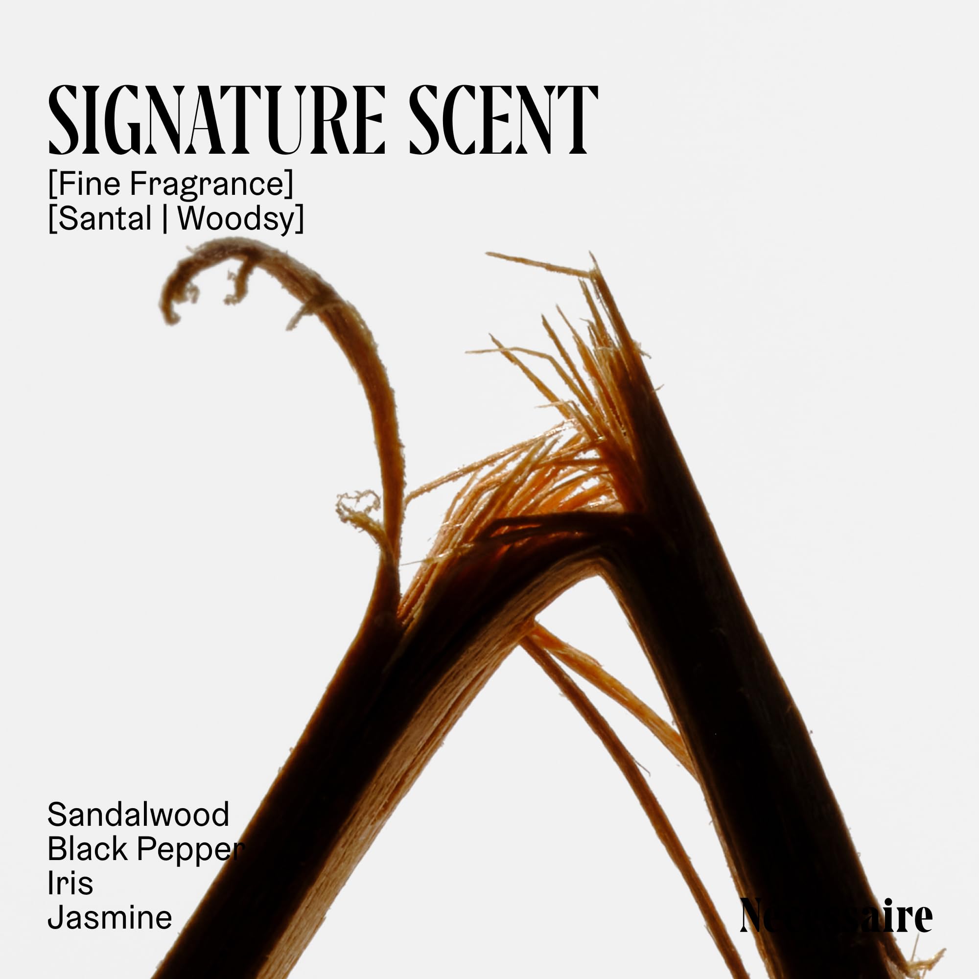 Image highlighting Nécessaire Pure Sandalwood Oil as a core fragrance component.