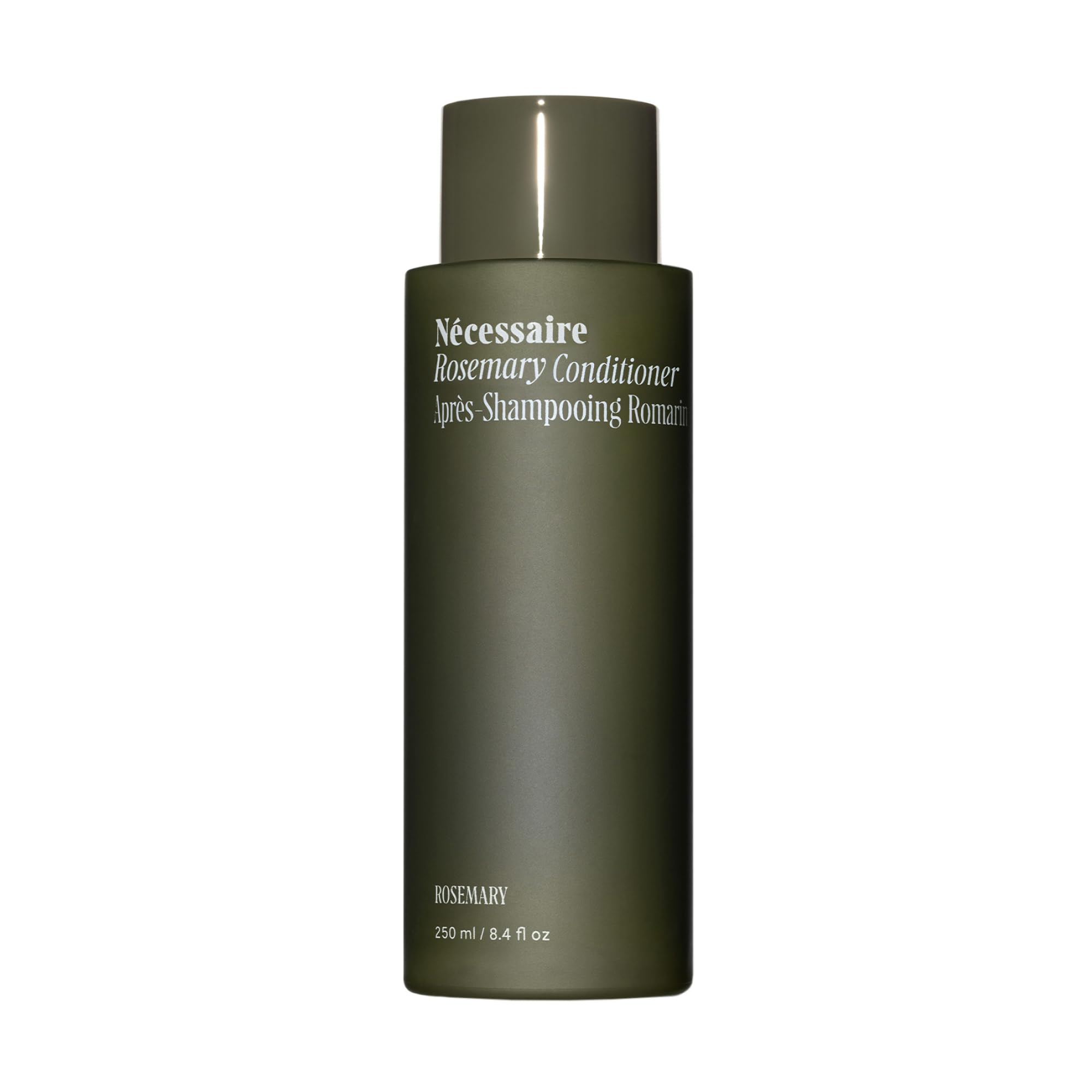 Nécessaire Rosemary Conditioner bottle pouring for daily strengthening and detangling