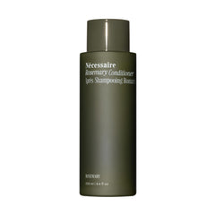 Nécessaire Rosemary Conditioner bottle pouring for daily strengthening and detangling