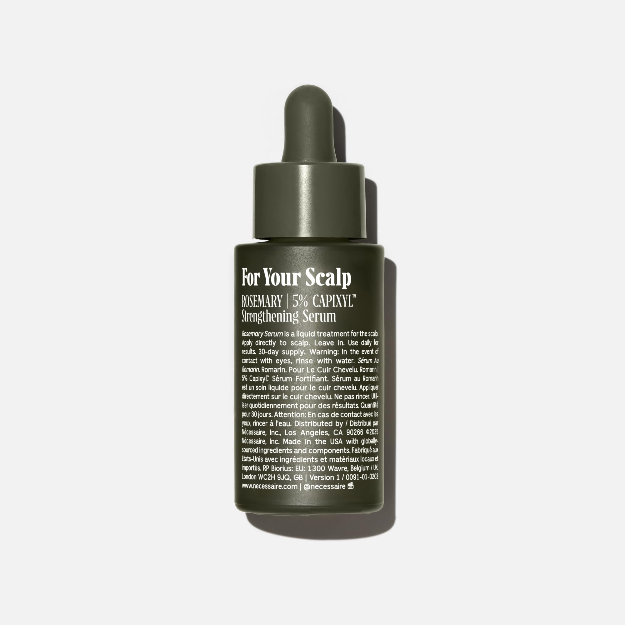 Nécessaire Rosemary Serum dropper close-up highlights precise, easy application.