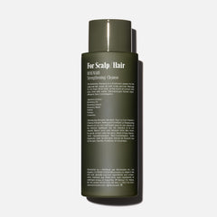 Nécessaire Rosemary Shampoo lather closeup, emphasizing non-drying cleansing with plant-based surfactants.