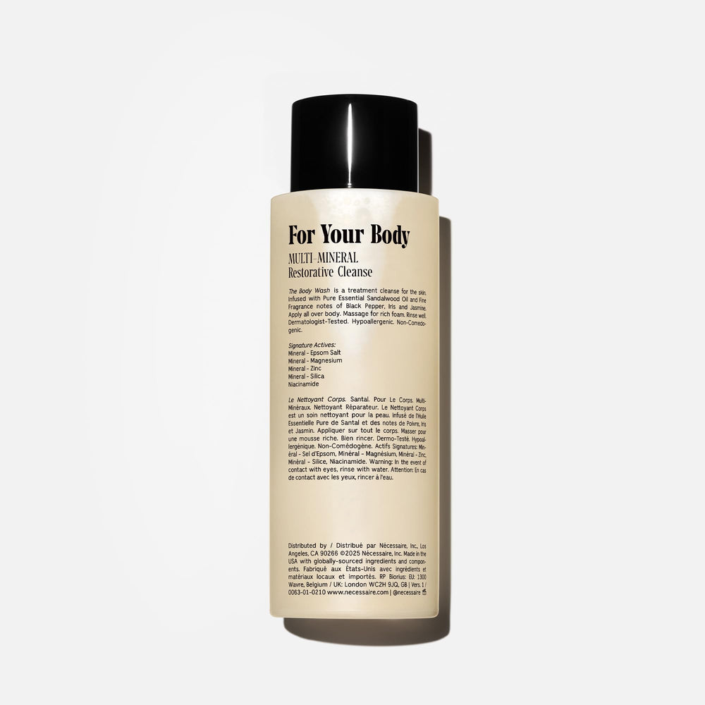 Label close-up of Nécessaire Santal noting epsom salt and minerals in the formula.