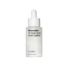 Nécessaire Scalp Serum bottle closeup showing fragrance-free, residue-free formula for daily use