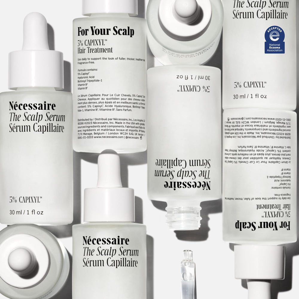 Nécessaire Scalp Serum capixyl and hyaluronic visuals highlighting key ingredients