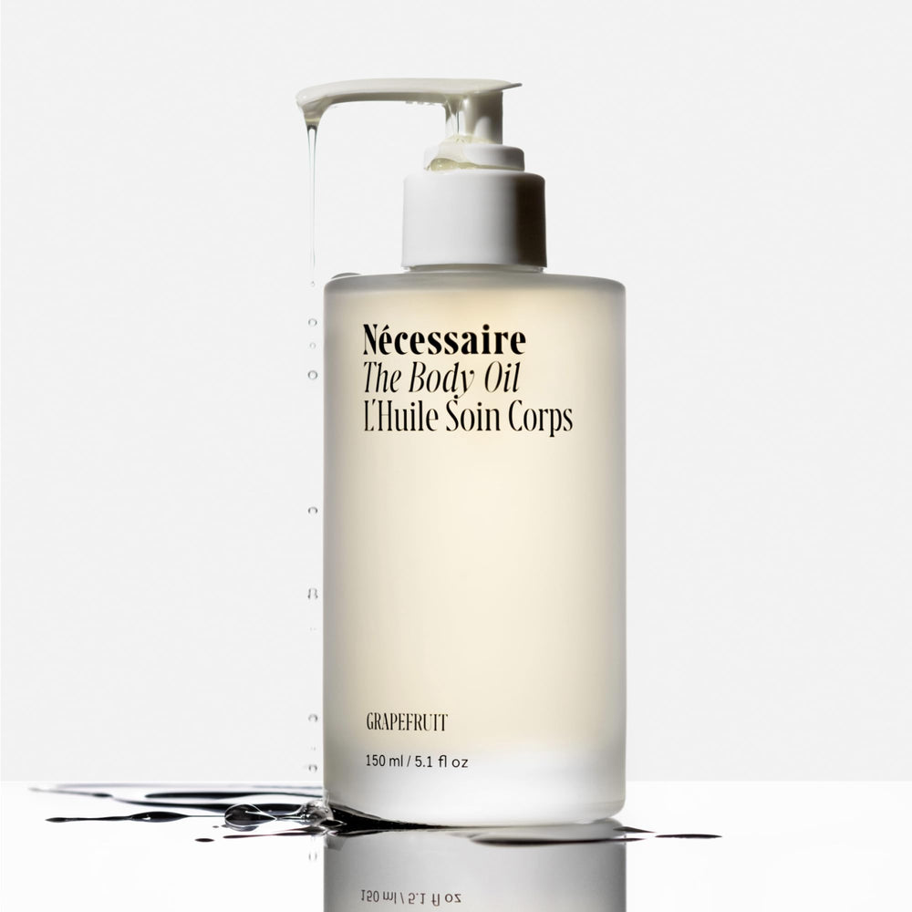Nécessaire The Body Oil neroli geranium note close-up suggests a luxurious fragrance experience.