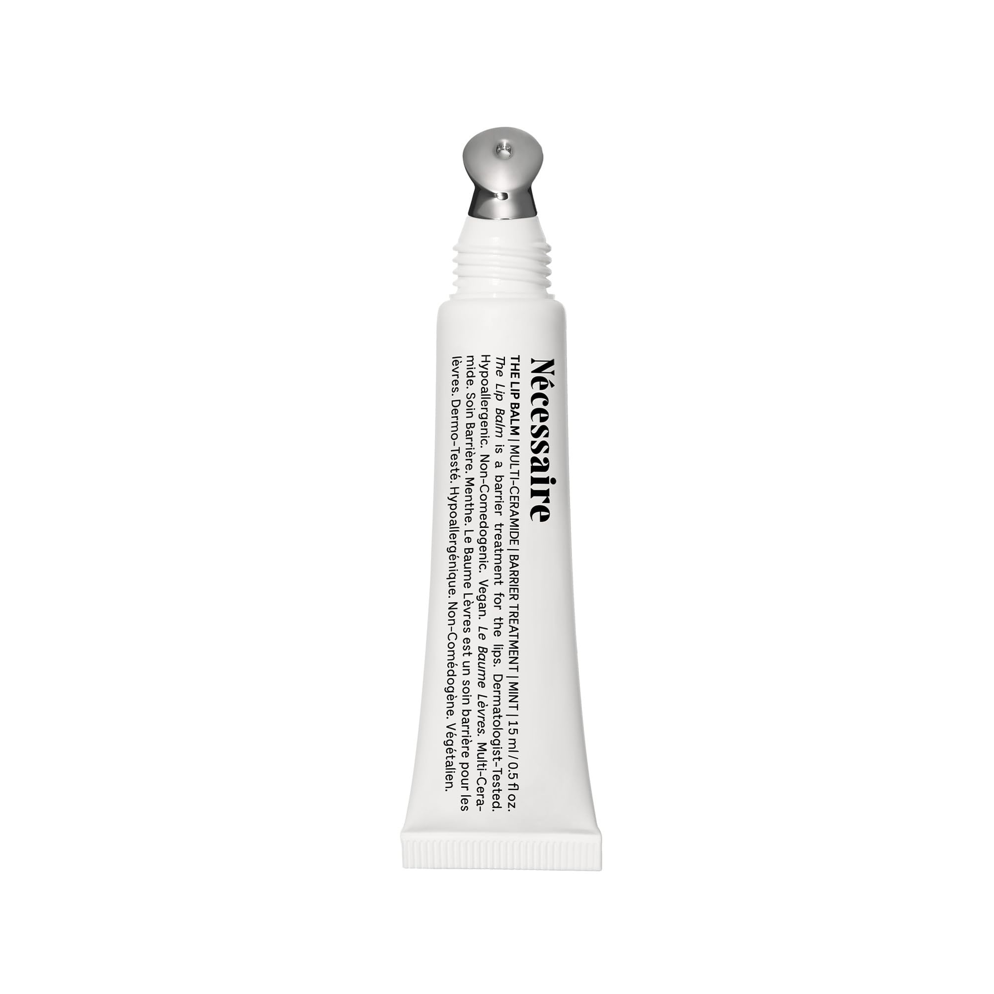 Nécessaire The Lip Balm tube closeup highlights glossy packaging and lip hydration benefits.