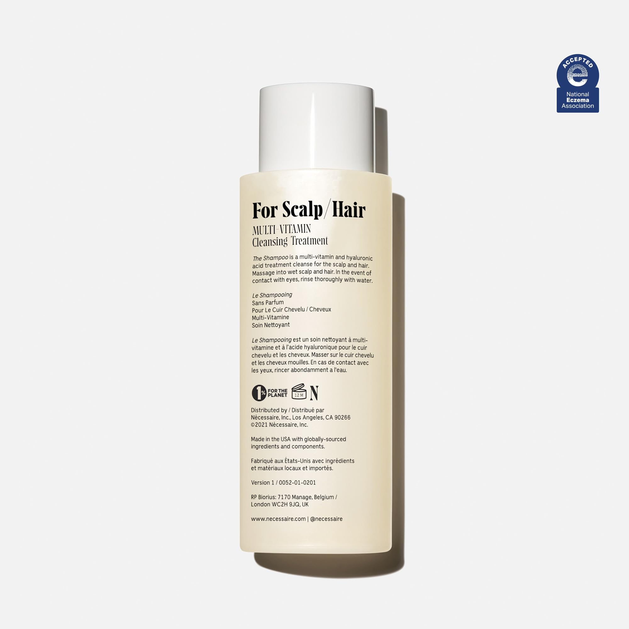 Nécessaire The Shampoo pump-action close-up showcasing gentle cleansing in daily routine.