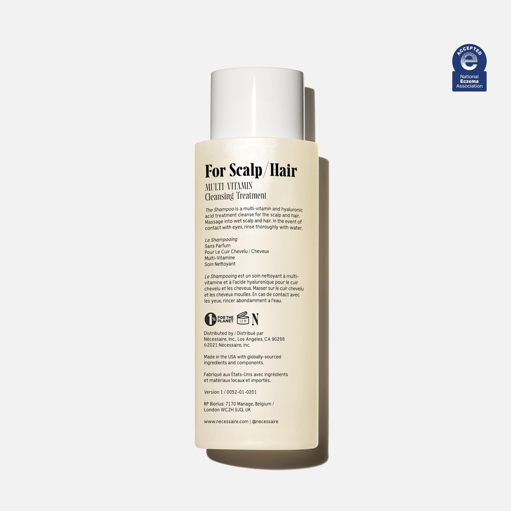 Nécessaire The Shampoo pump-action close-up showcasing gentle cleansing in daily routine.