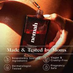 Close-up of Nemah Belly Oil texture showing light, non-greasy absorption.
