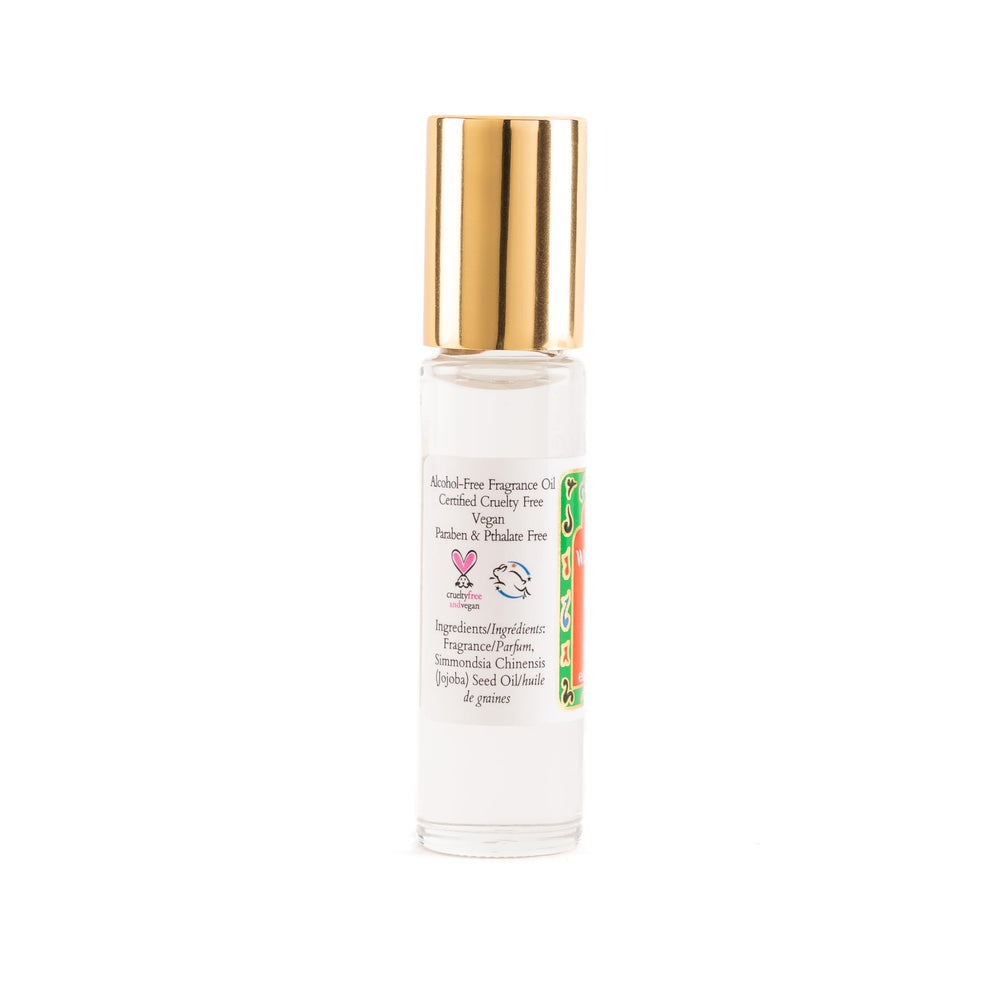 Nemat White Musk rollerball close-up shows smooth glide for easy, precise application.