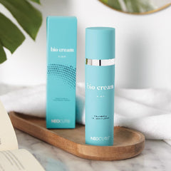 Neocutis Bio Cream Firm cream swirl on skin illustrating hydration and smoothing.