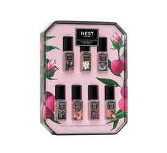 Nest New York discovery set Clear packaging showcases seven mini rollerballs for versatile on-the-go fragrance moments.