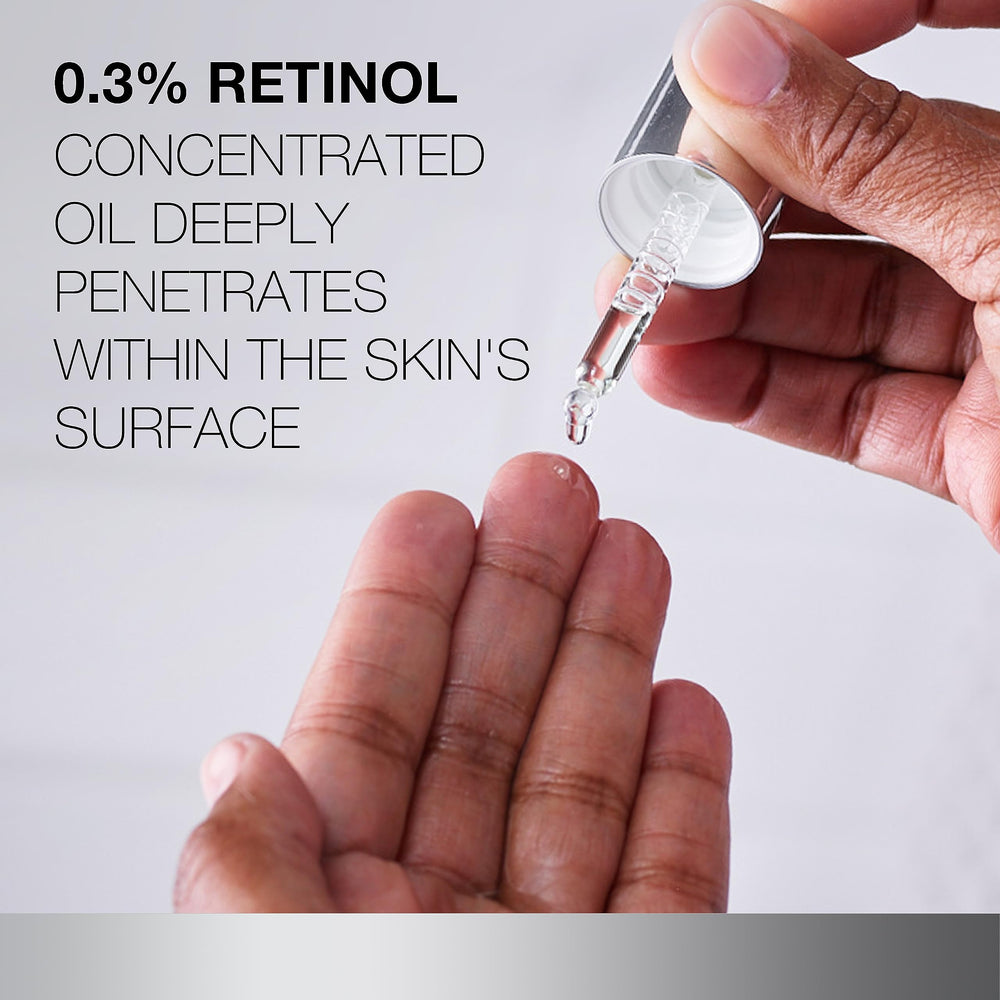 Neutrogena Rapid Wrinkle Repair Oil on a bathroom counter with skincare routine.