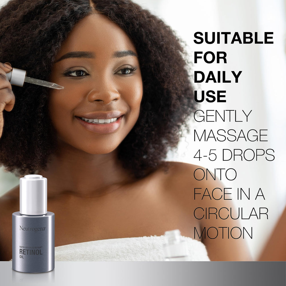 Neutrogena Rapid Wrinkle Repair Oil dropper applying to cleansed skin at night.