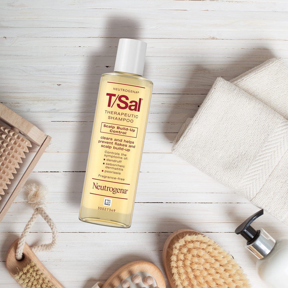 Neutrogena T/Sal schematic before and after showing reduced scalp build-up