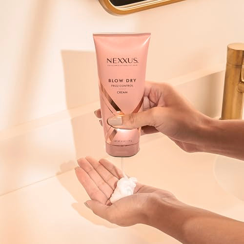 Nexxus Blow Dry Cream in hair during a blowout for added body
