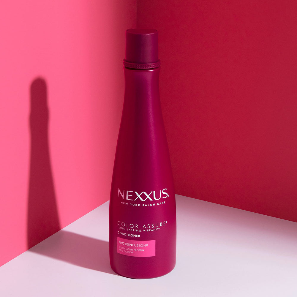Nexxus Color Assure color-vibrancy graph image; visual of long-lasting color retention.