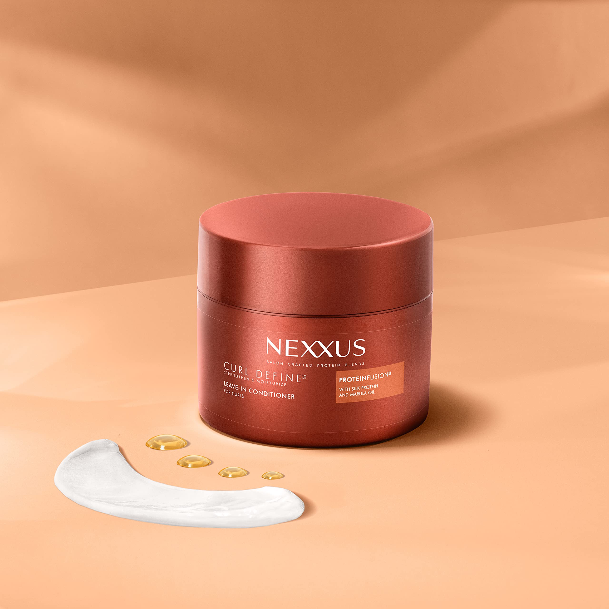 Nexxus Curl Define apply-on curls demonstrates quick styling and frizz control.