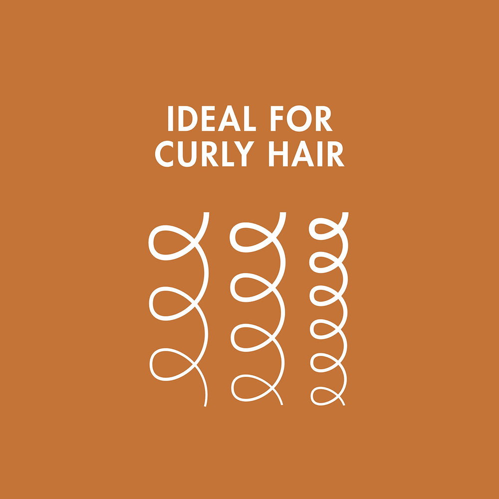 Nexxus Curl Define Marula Oil bottle reflects lightweight hydration for shiny, bouncy curls.