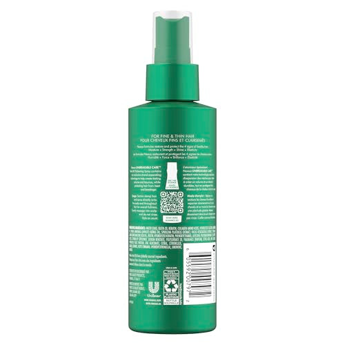 Nexxus Root Lift spray in action on damp hair for added volume.