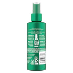 Nexxus Root Lift spray in action on damp hair for added volume.