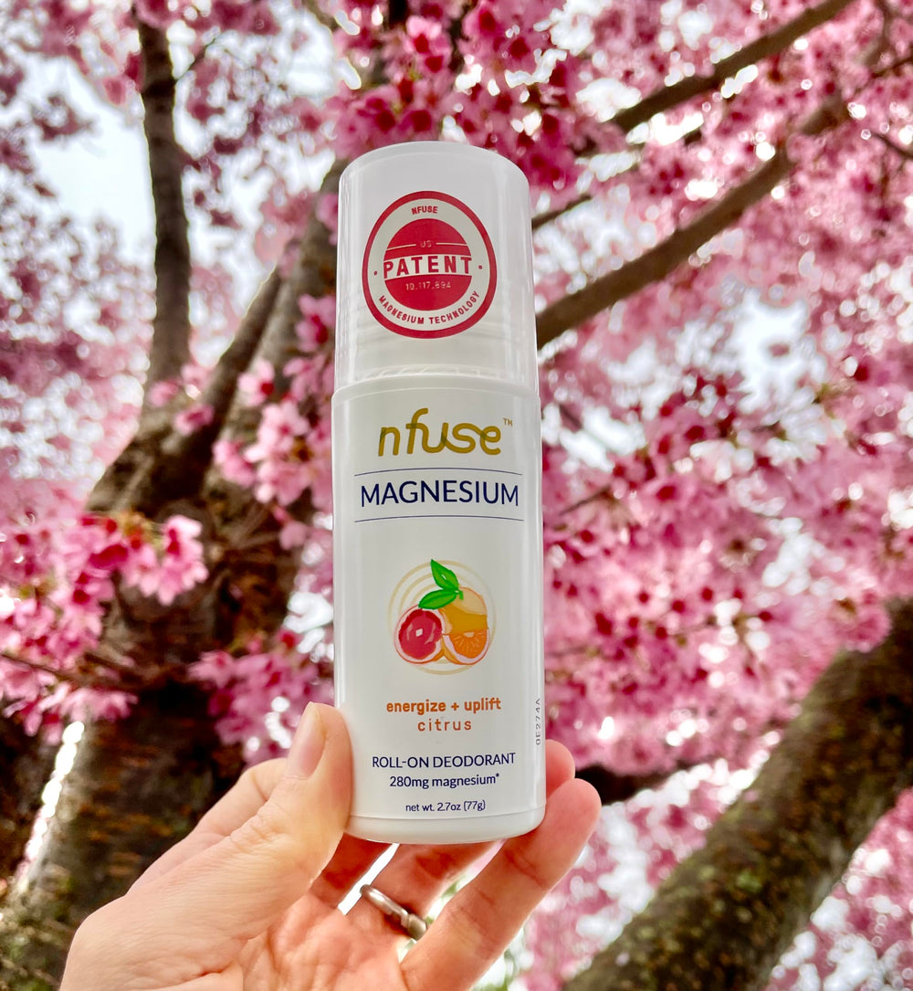 nfuse roll-on application closeup showing easy, gentle application for on-the-go refreshment.