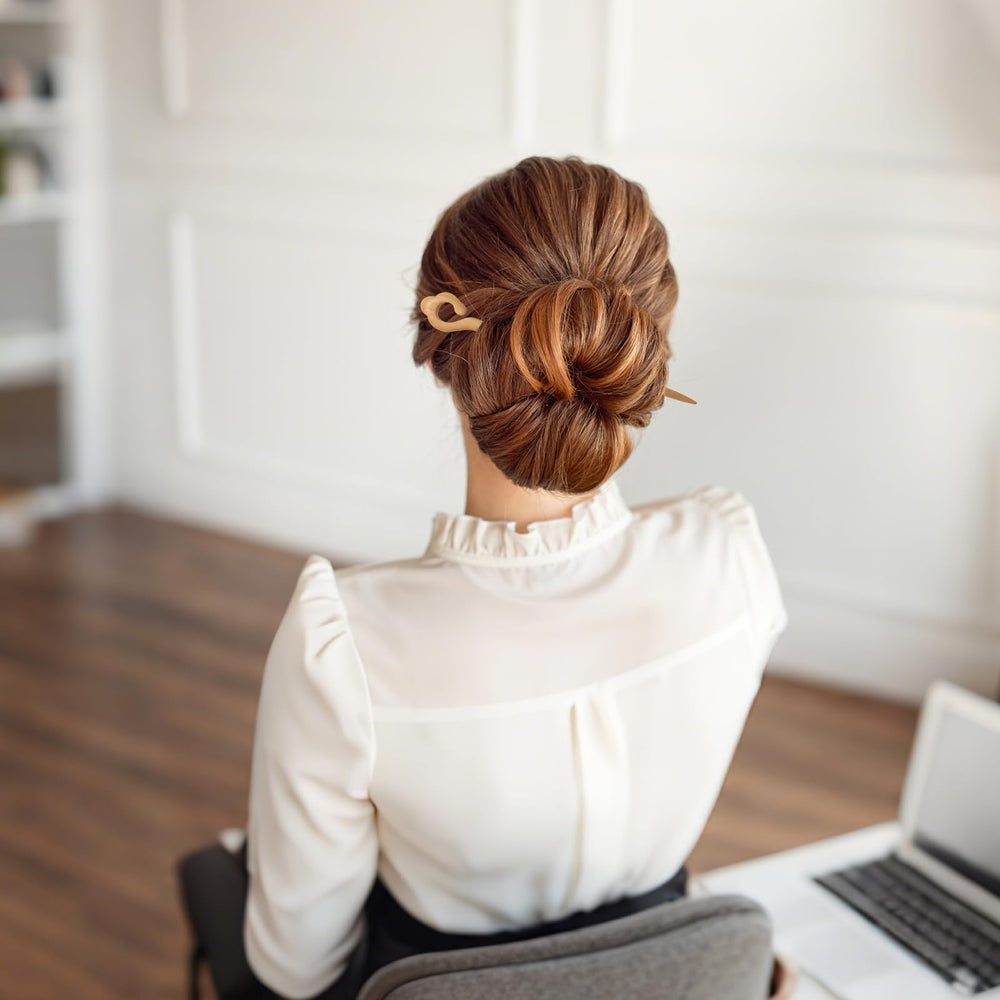 Ngdhkd bun-maker sticks transform loose hair into neat updos.