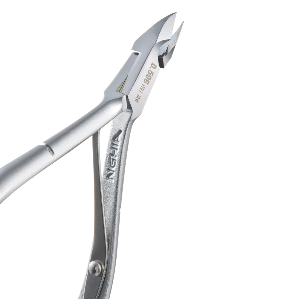 Nghia D-506 in use for neat, salon-quality cuticle maintenance