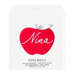 Nina Ricci Nina fragrance bottle close-up highlights the luxe design.