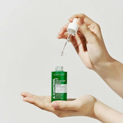 NINELESS A-Control texture close-up reveals smooth, fast-absorbing formula.