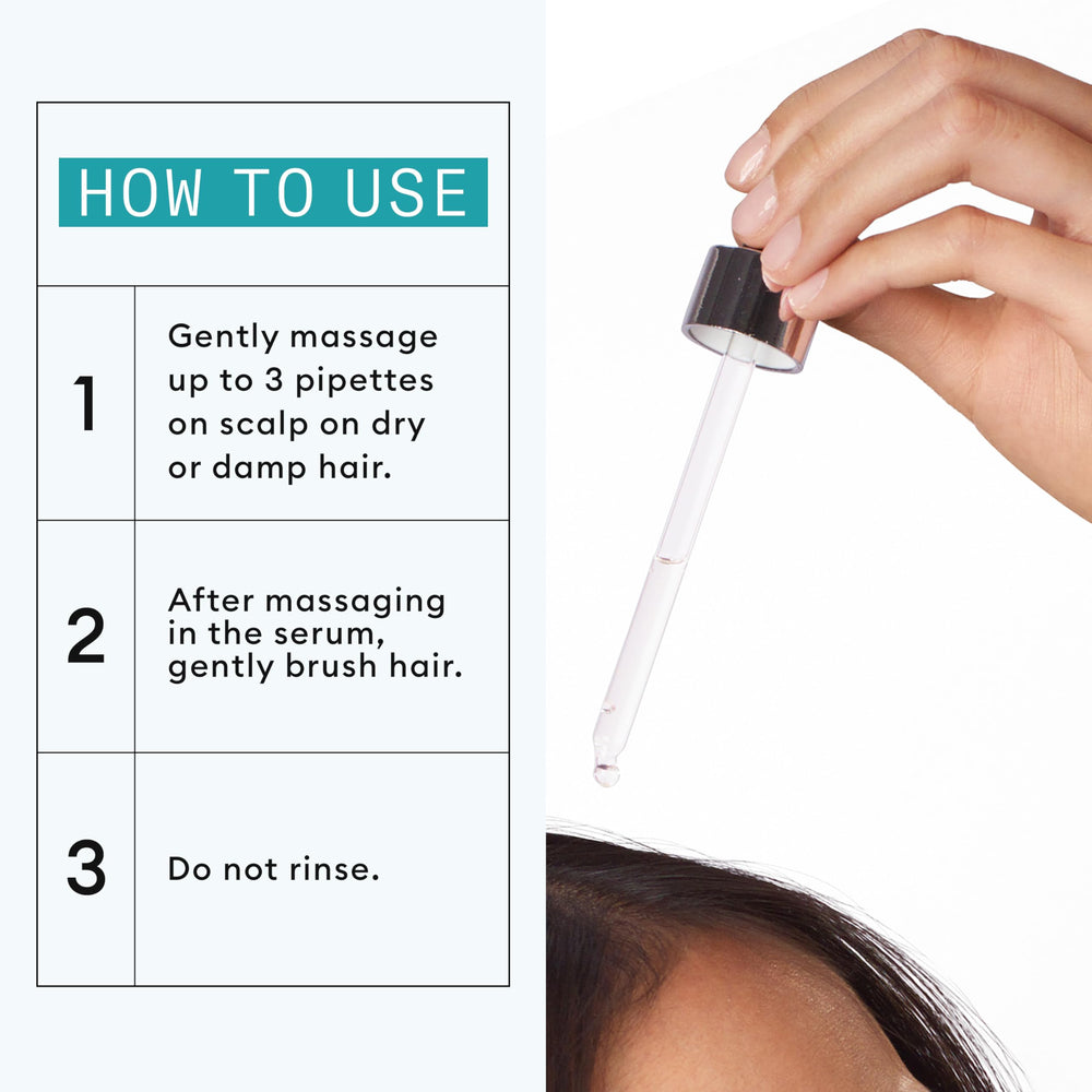 Applying Nioxin serum directly to scalp to boost root vitality