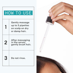 Applying Nioxin serum directly to scalp to boost root vitality