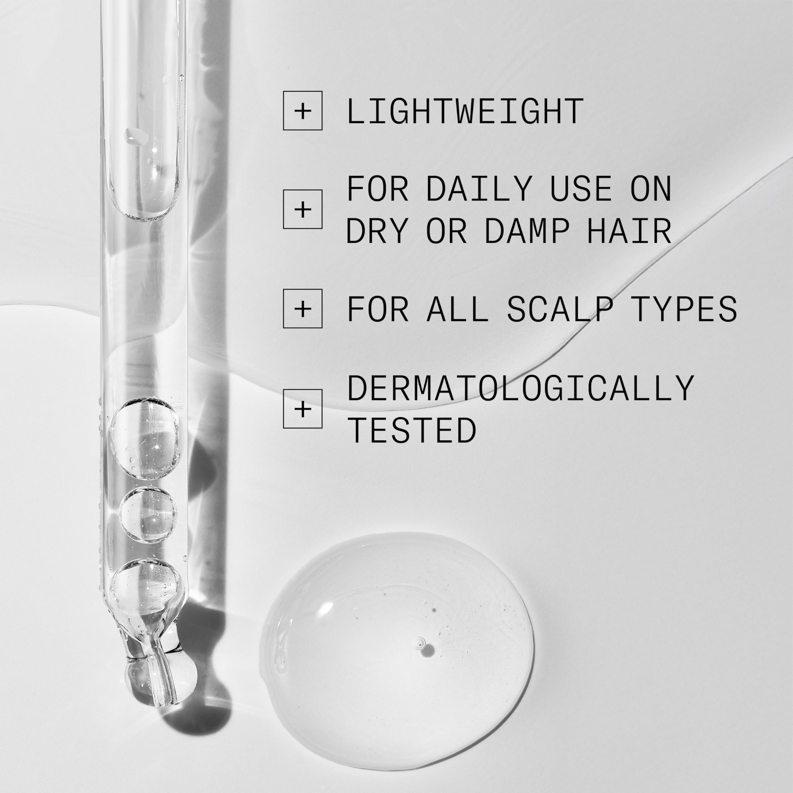 Nioxin bottle in hand to show 70mL size and travel convenience