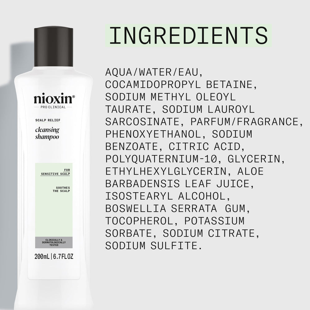 nioxin bottle staged with hair tools showing integration into daily routine