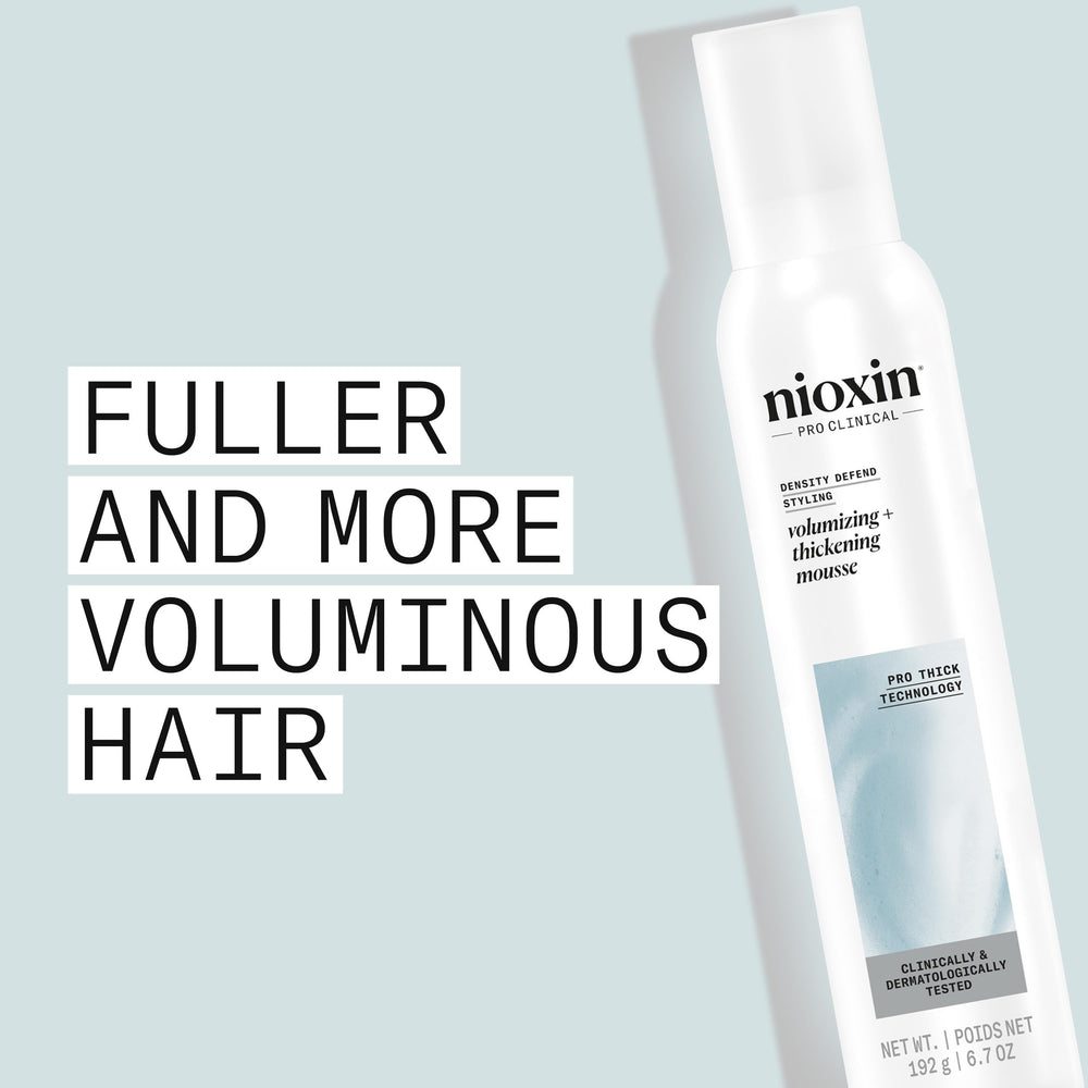 Nioxin foam in palm being applied for even distribution and lift
