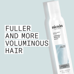 Nioxin foam in palm being applied for even distribution and lift