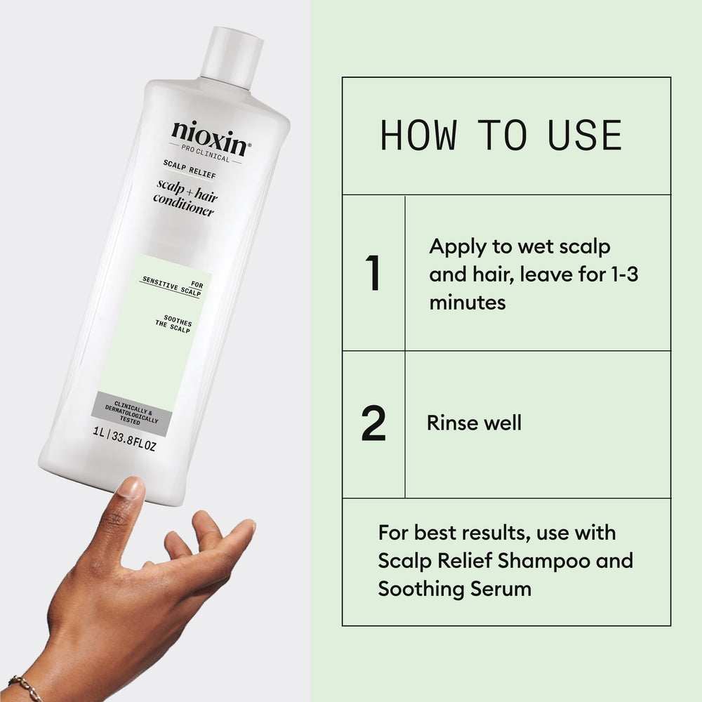 NIOXIN bottle in hand showing 33.8 fl oz scale and travel practicality